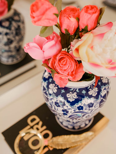 Overhead Shot of a Porcelain Flower Vase on Book | Avantte Interior Design