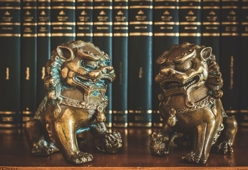 Two Brown Chinese Guardian Lions Figures on Table Top | Avantte Interior Design